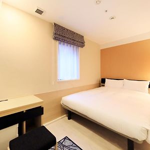 Kamer met een Queen Size Bed